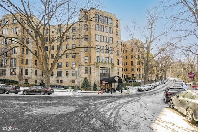 view of snow covered property