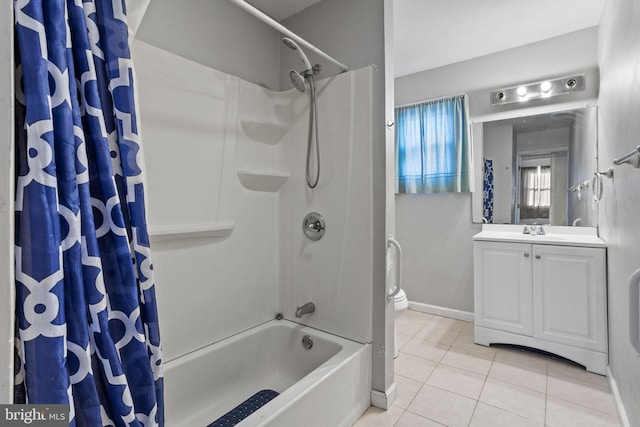 bathroom with vanity, shower / tub combo with curtain, and tile patterned floors