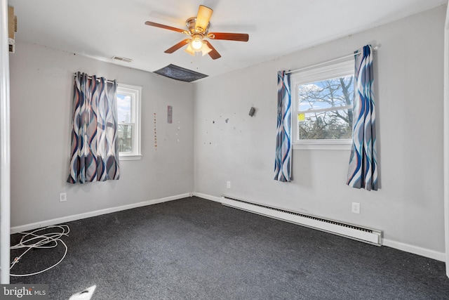 empty room with ceiling fan and a baseboard radiator