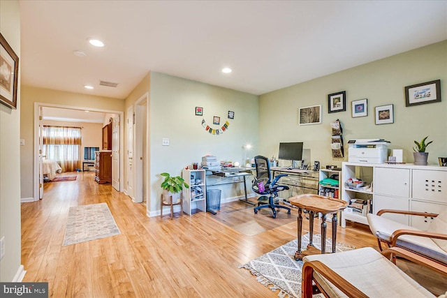 home office featuring light wood-type flooring