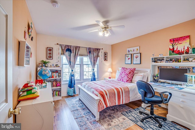 bedroom featuring ceiling fan and light hardwood / wood-style floors