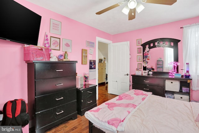 bedroom featuring ceiling fan and hardwood / wood-style floors