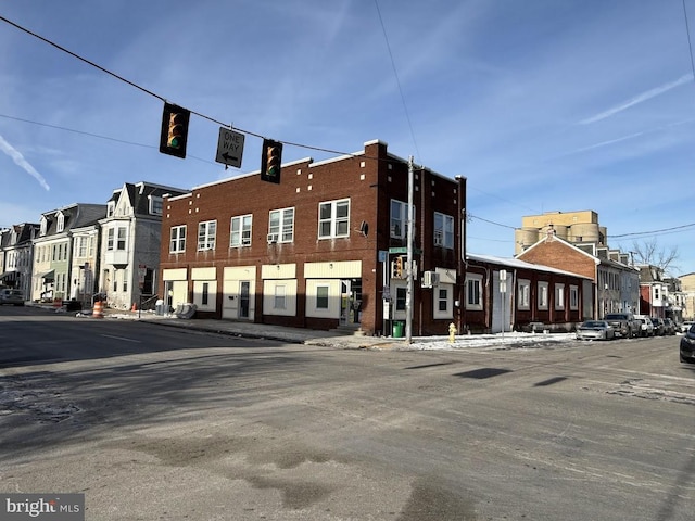 view of building exterior with a residential view