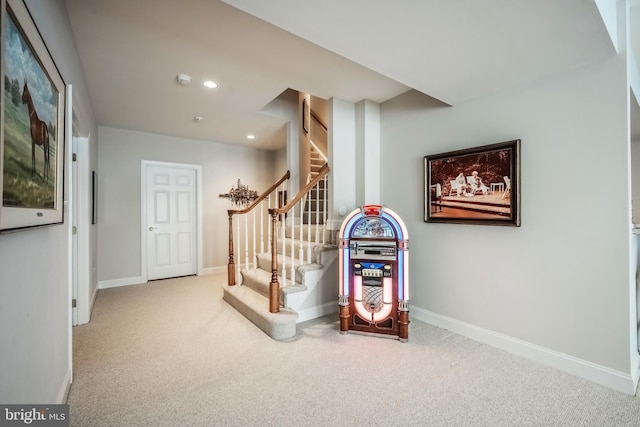 stairway with carpet floors