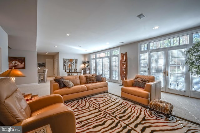 living room with light colored carpet