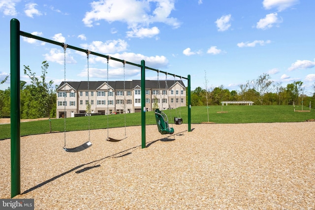 view of play area featuring a lawn