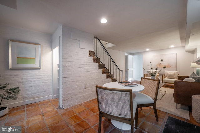 dining room with stairway and recessed lighting