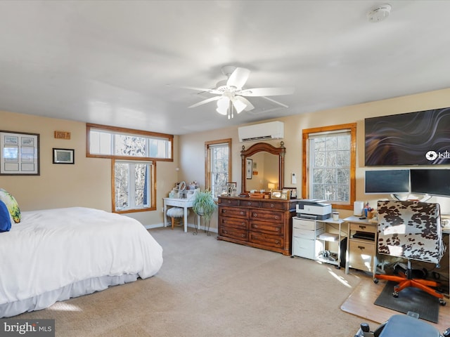 bedroom with light carpet, a wall unit AC, and ceiling fan