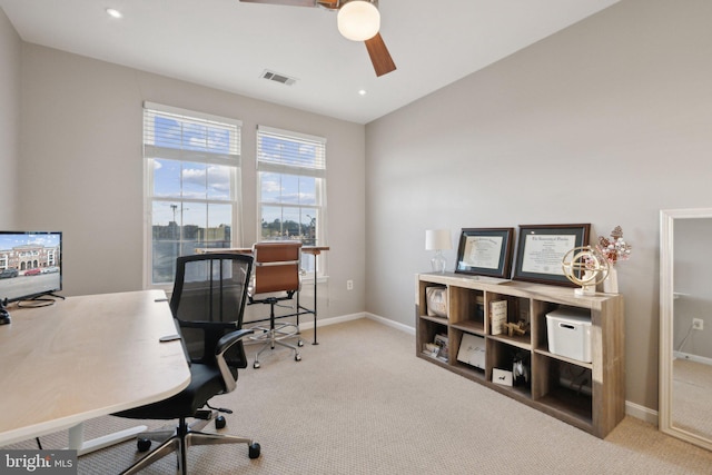 office with ceiling fan and light carpet