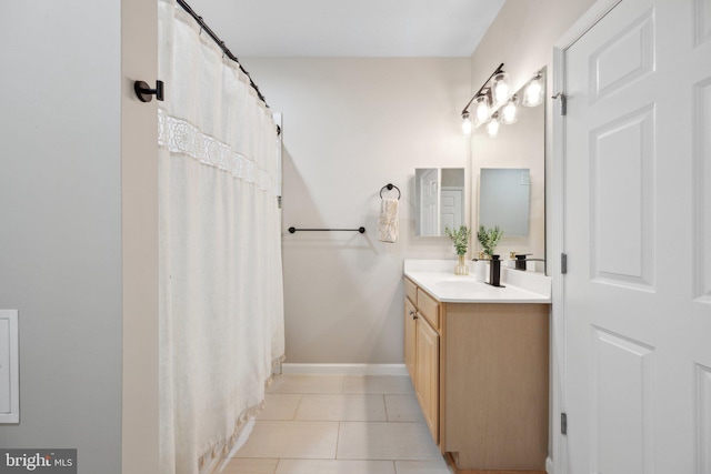 bathroom featuring vanity and tile patterned floors