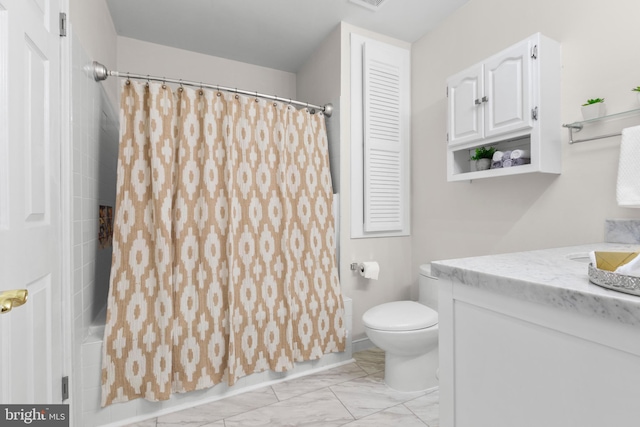 full bathroom with toilet, vanity, and shower / bath combination with curtain