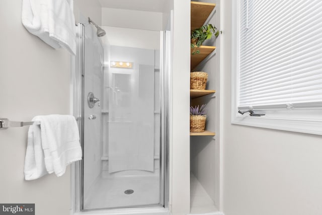 bathroom featuring walk in shower