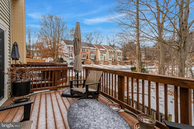 view of snow covered deck