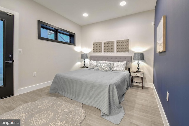 bedroom featuring wood-type flooring