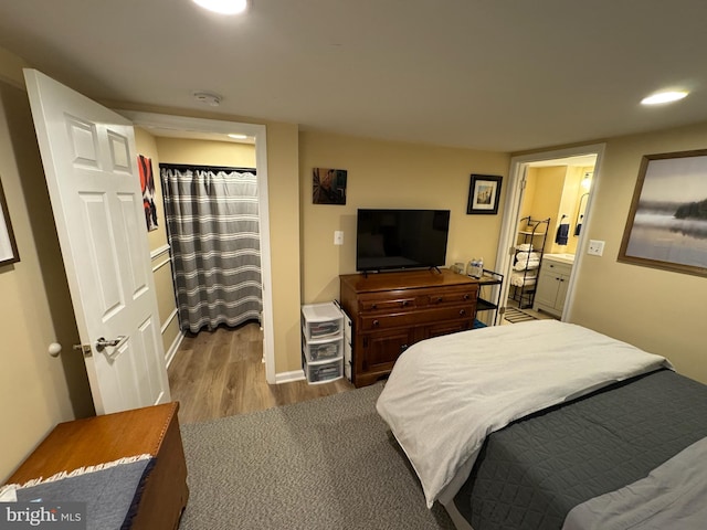 bedroom featuring hardwood / wood-style flooring