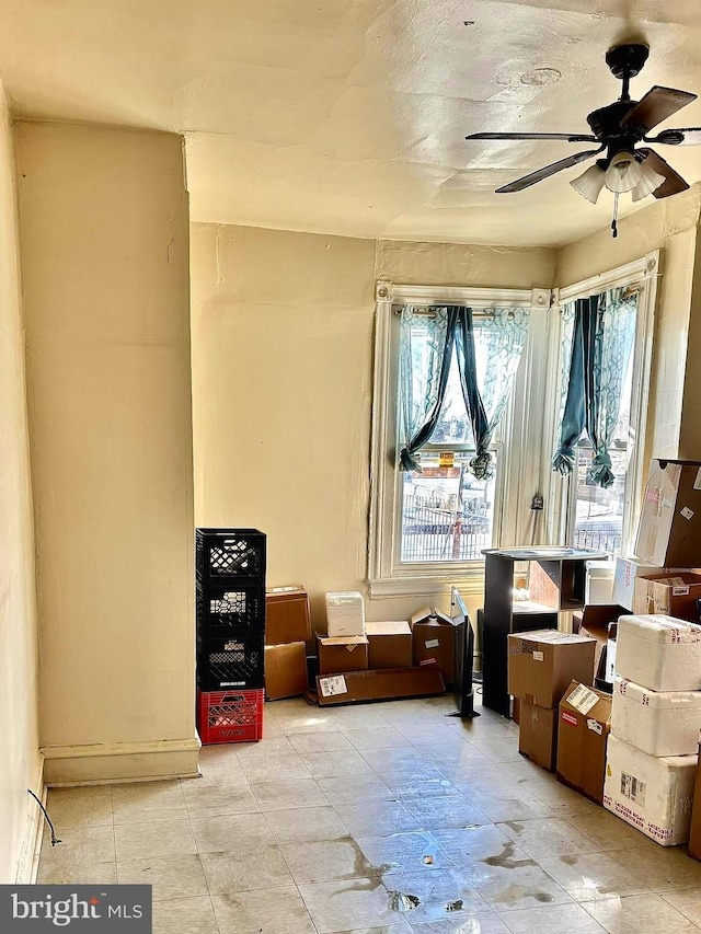 miscellaneous room featuring ceiling fan