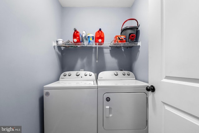 laundry area with washer and clothes dryer