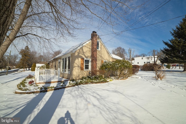 view of snow covered property