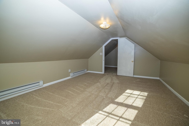 bonus room with lofted ceiling, baseboard heating, and carpet