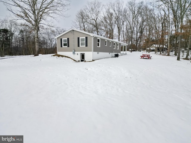 view of snow covered property