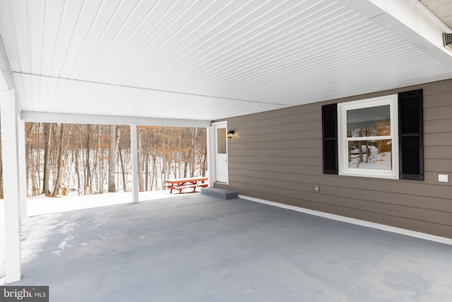 view of snow covered patio