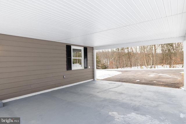 view of snow covered patio