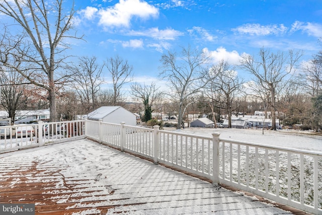 view of snow covered deck