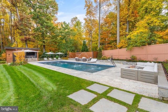 view of pool with an outdoor living space with a fire pit, a lawn, a patio area, an outdoor structure, and pool water feature