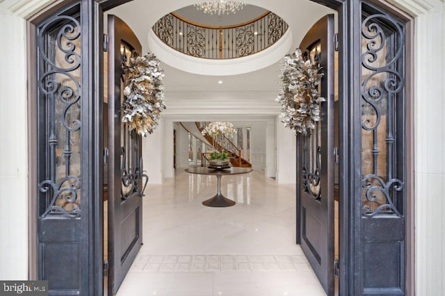 entrance foyer featuring ornamental molding