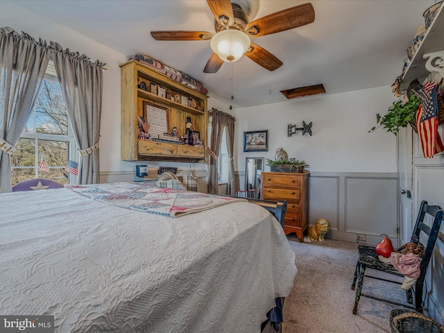 carpeted bedroom featuring ceiling fan