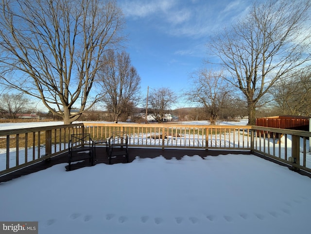 view of snow covered deck