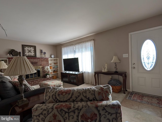 living room featuring light tile patterned floors and a fireplace