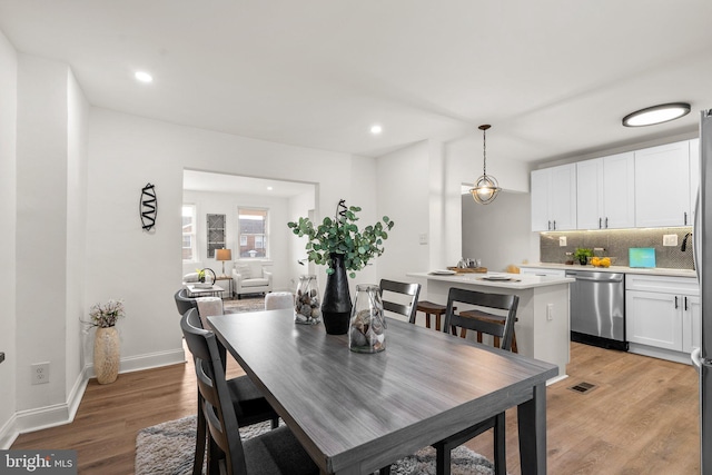 dining area featuring light hardwood / wood-style flooring