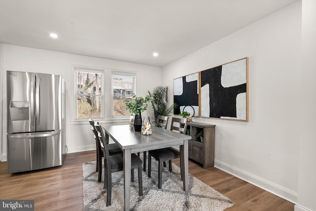 dining room featuring hardwood / wood-style flooring