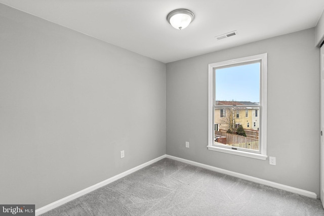 unfurnished room featuring carpet floors