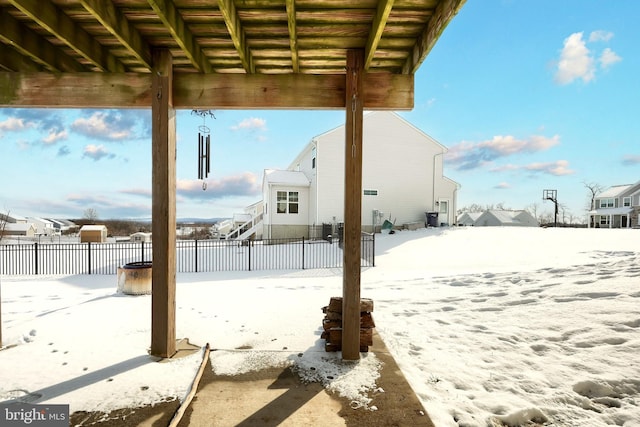 view of yard layered in snow