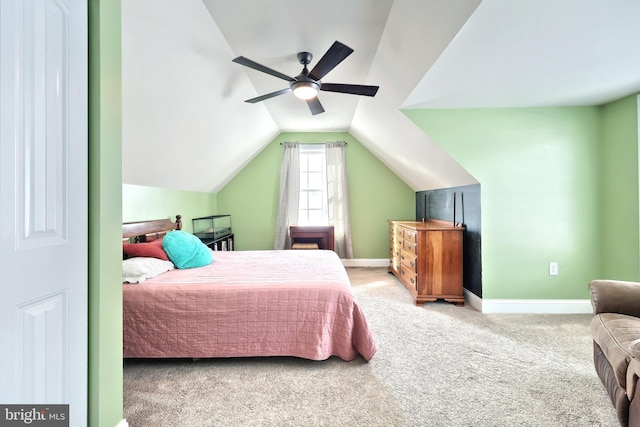 bedroom featuring ceiling fan, carpet floors, and vaulted ceiling