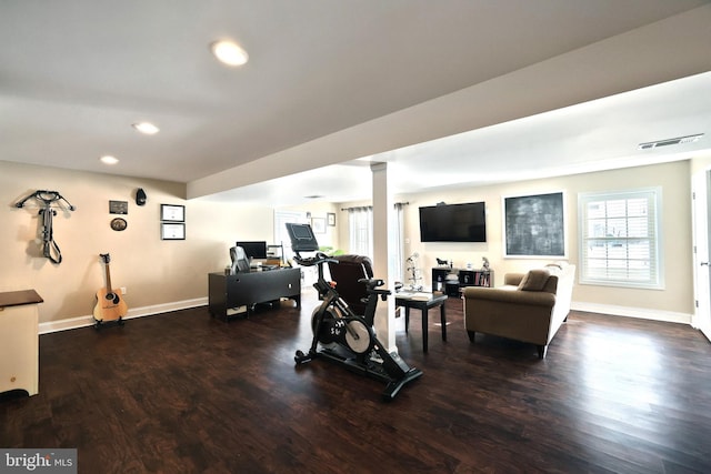 workout area featuring dark hardwood / wood-style floors