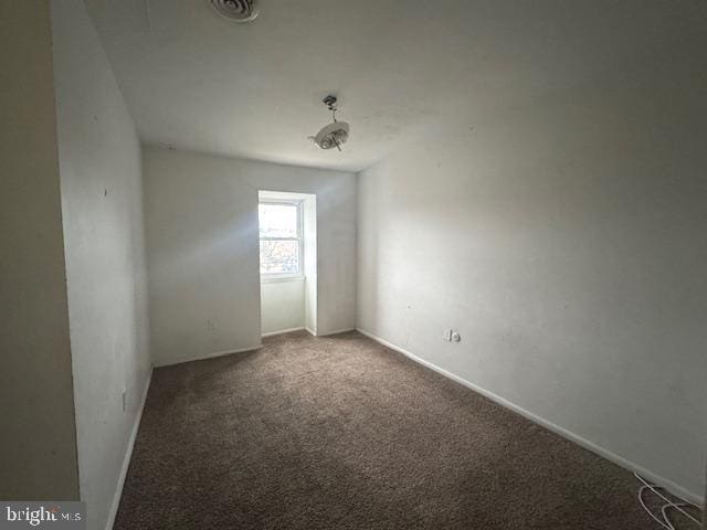 empty room featuring carpet