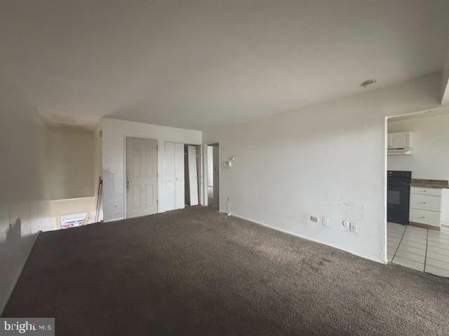 interior space with light colored carpet