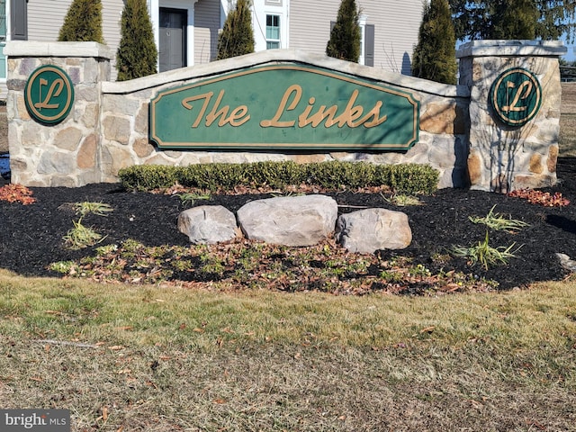 view of community sign