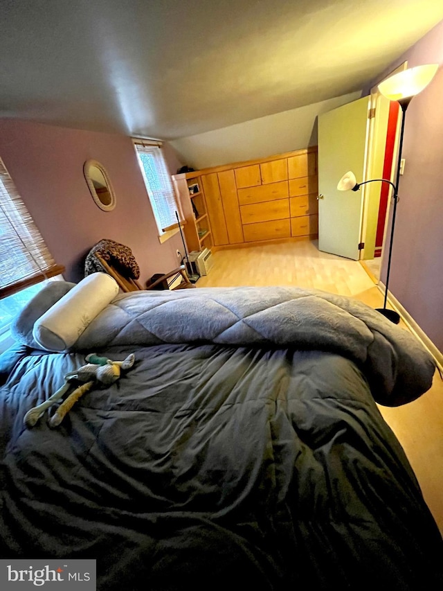 bedroom featuring light wood-type flooring