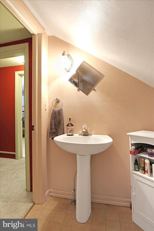 bathroom with tile patterned flooring