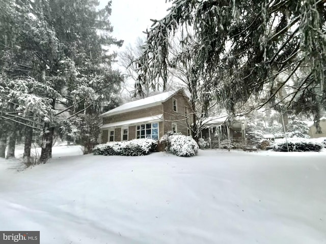 view of snow covered property