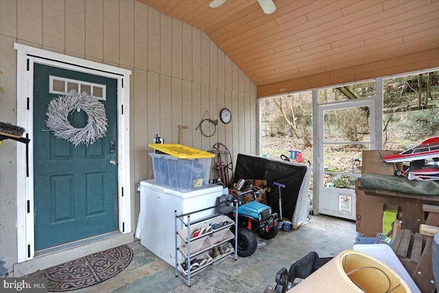 doorway to property with ceiling fan