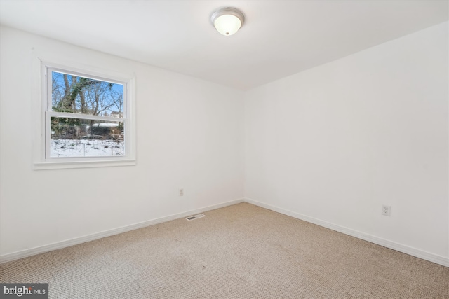 view of carpeted spare room