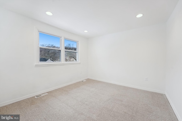 view of carpeted spare room