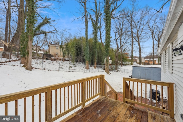 view of snow covered deck