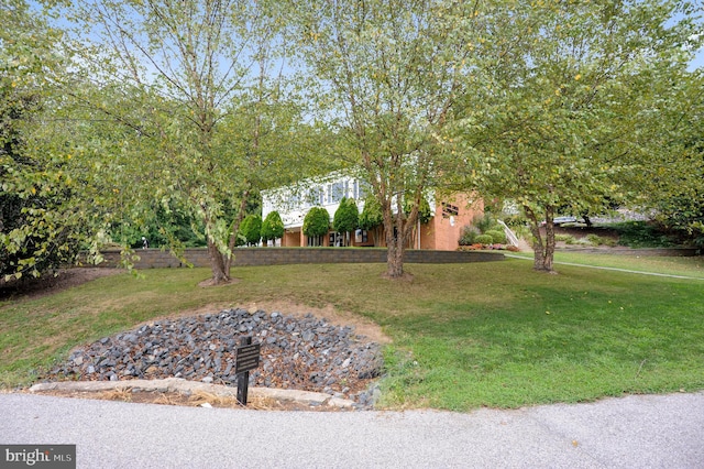 view of front of home with a front yard