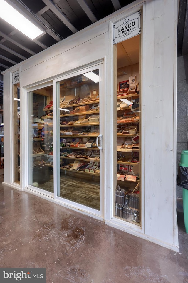 wine cellar with concrete flooring